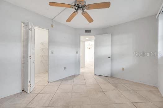 spare room with ceiling fan