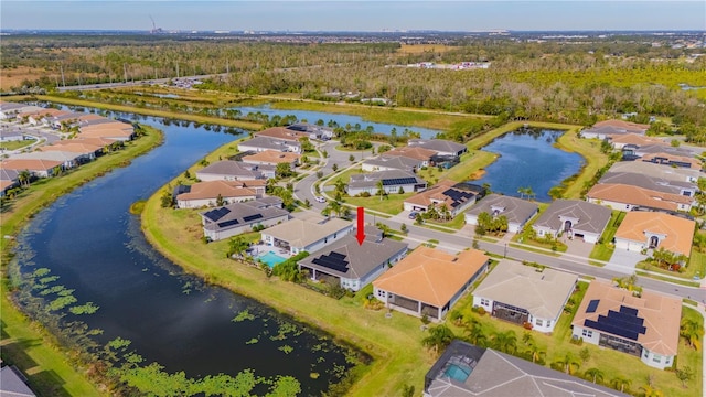 drone / aerial view featuring a water view