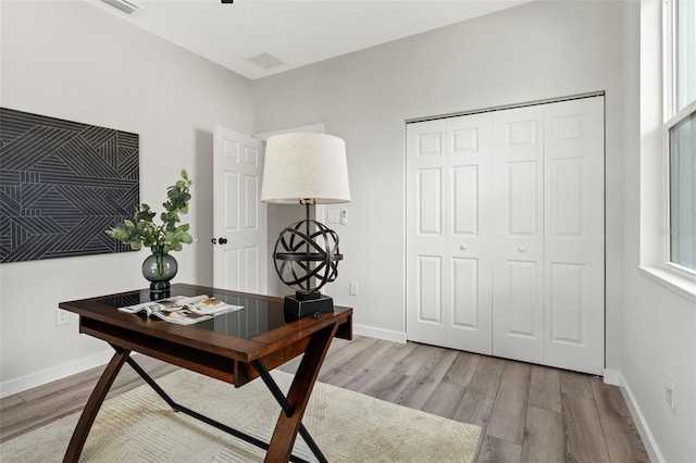 office area with light wood-type flooring