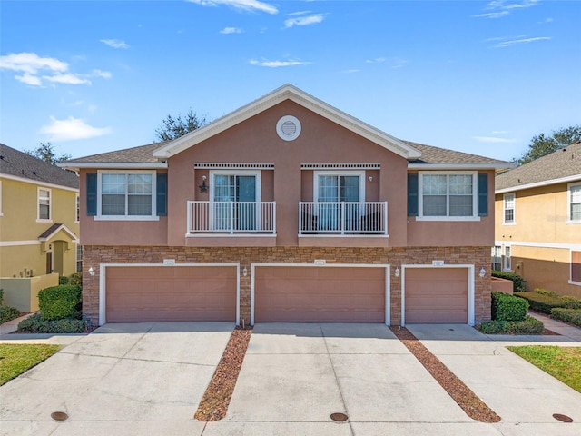 multi unit property featuring a garage