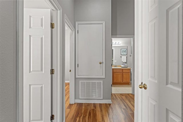 hall featuring light hardwood / wood-style floors