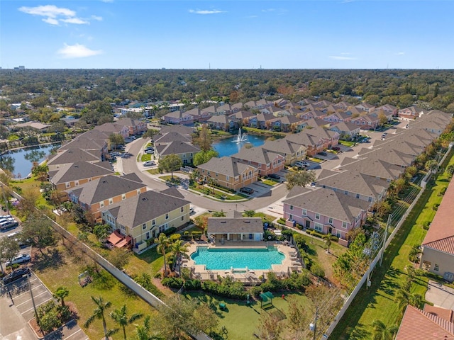 drone / aerial view with a water view