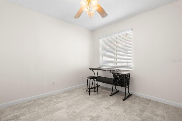 office area with ceiling fan