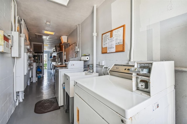 laundry area featuring washing machine and dryer