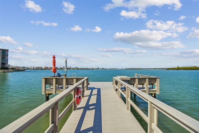 view of dock with a water view