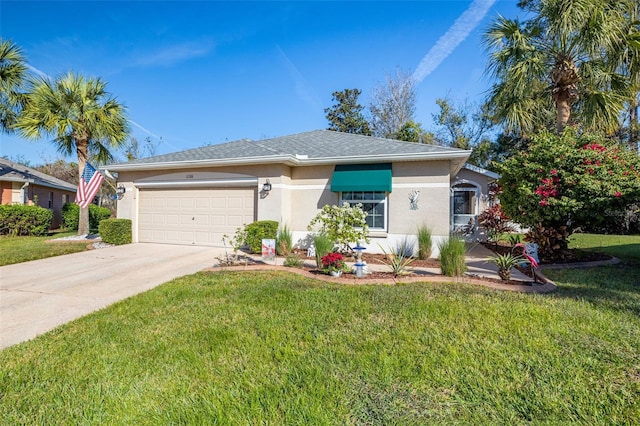 view of front of home featuring a garage and a front yard