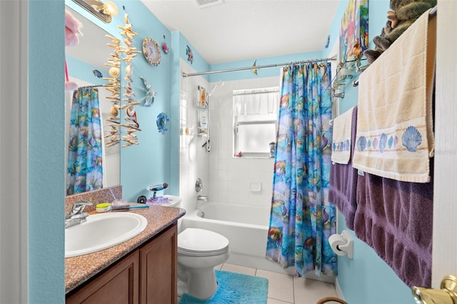 full bathroom featuring toilet, shower / bath combination with curtain, vanity, and tile patterned floors