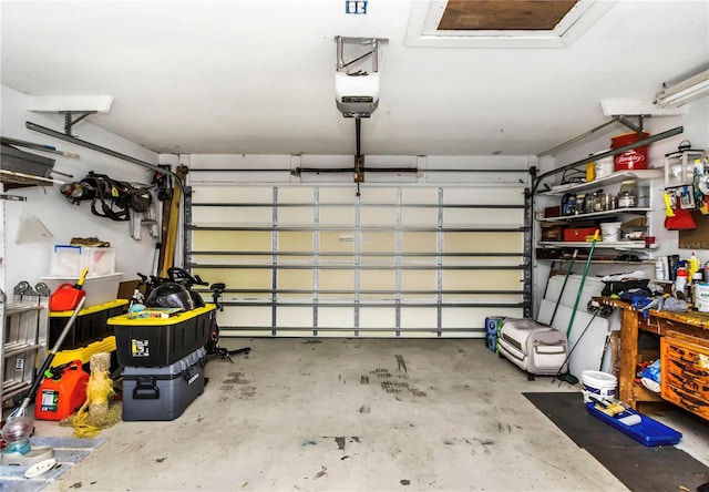 garage featuring a garage door opener