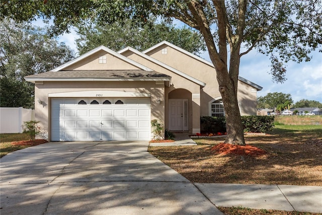 view of front of property featuring a garage