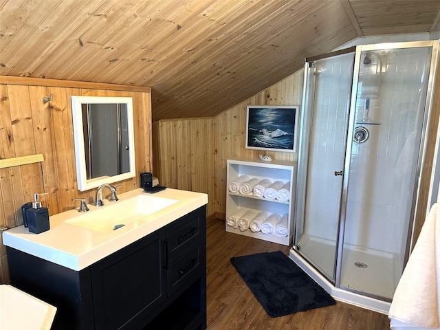 bathroom with vanity, wood walls, lofted ceiling, wood-type flooring, and wood ceiling