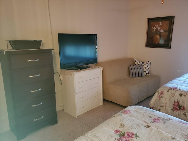 bedroom featuring light tile patterned flooring