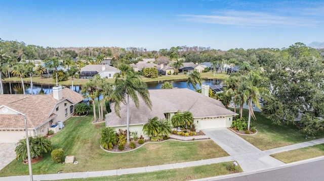 drone / aerial view featuring a water view