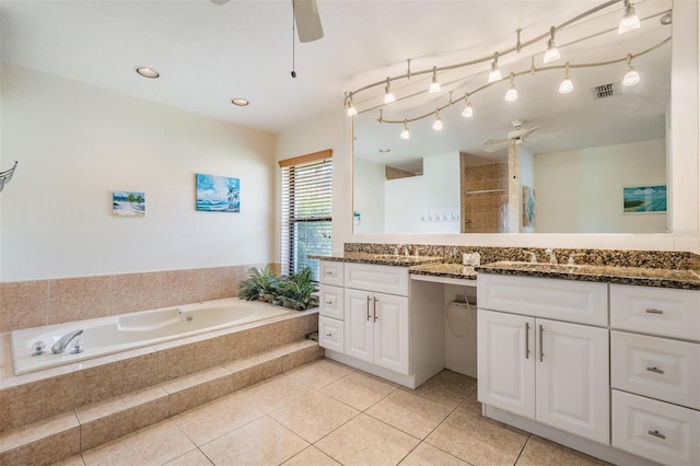 bathroom featuring tile patterned floors, vanity, separate shower and tub, and ceiling fan