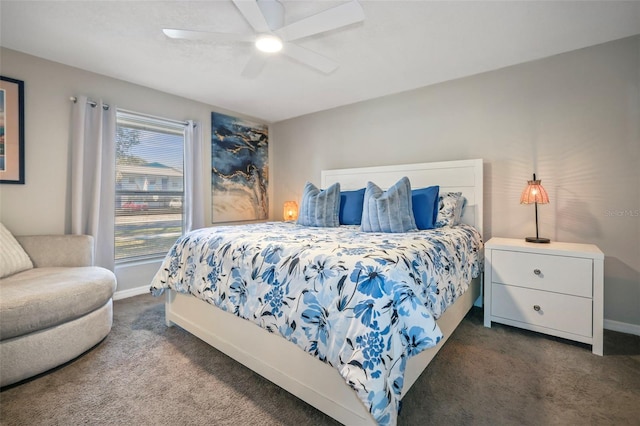 bedroom with ceiling fan and carpet floors