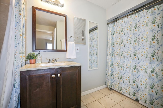 bathroom with vanity and tile patterned floors