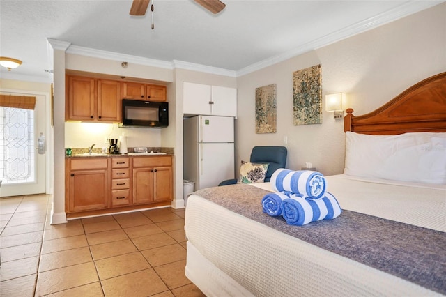 bedroom with ornamental molding, freestanding refrigerator, ceiling fan, and light tile patterned floors