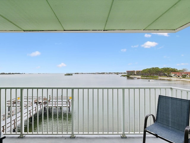 balcony featuring a water view