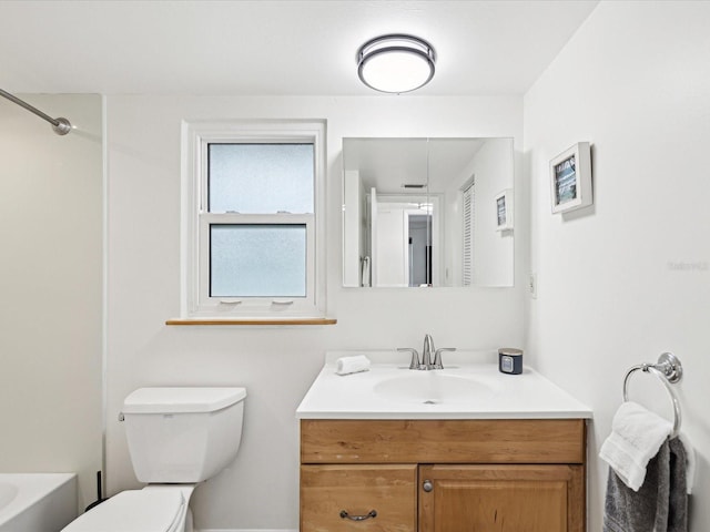 full bathroom featuring  shower combination, vanity, and toilet