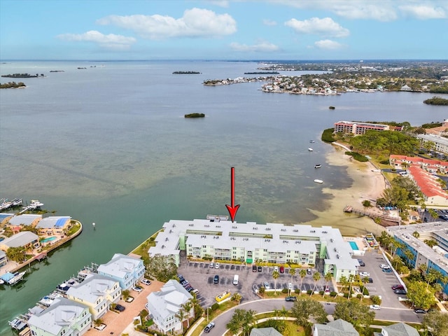 birds eye view of property featuring a water view