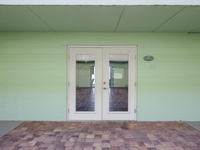 entrance to property featuring french doors