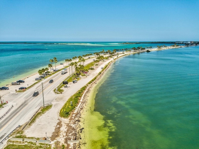 aerial view featuring a view of the beach and a water view