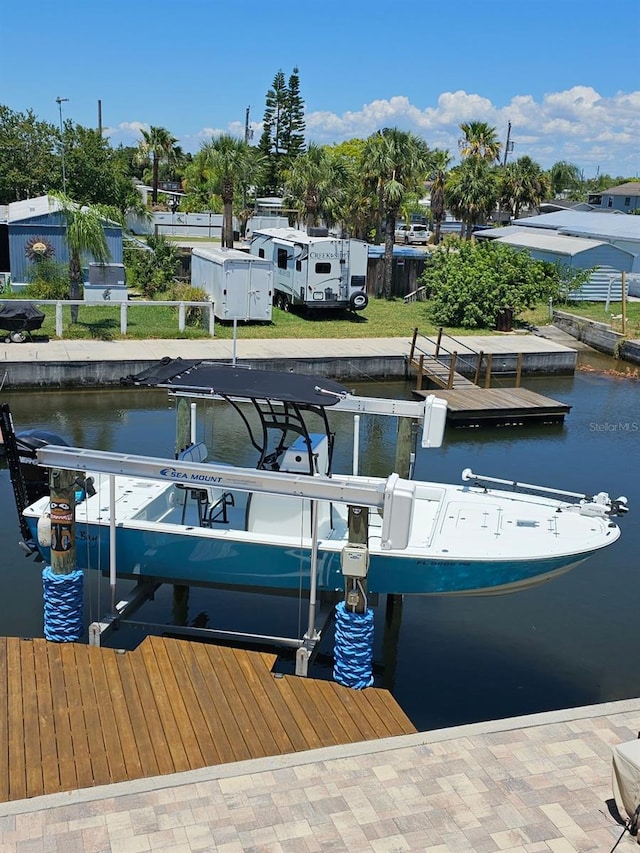 view of dock with a water view