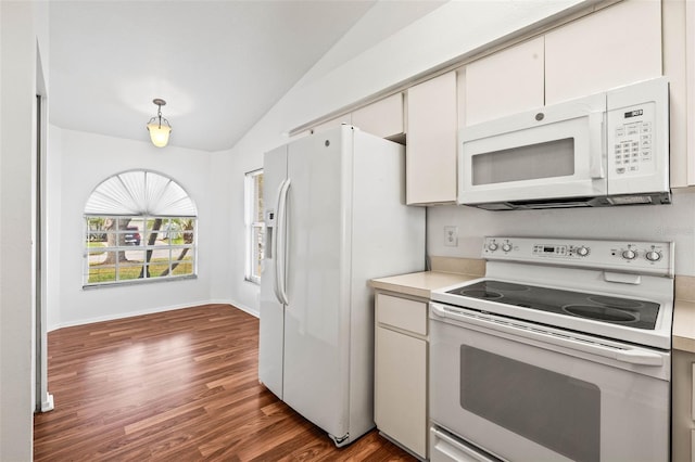 kitchen with white cabinets, dark hardwood / wood-style flooring, white appliances, and vaulted ceiling