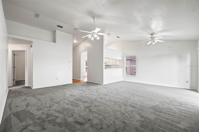 unfurnished living room with ceiling fan, carpet floors, a textured ceiling, and high vaulted ceiling