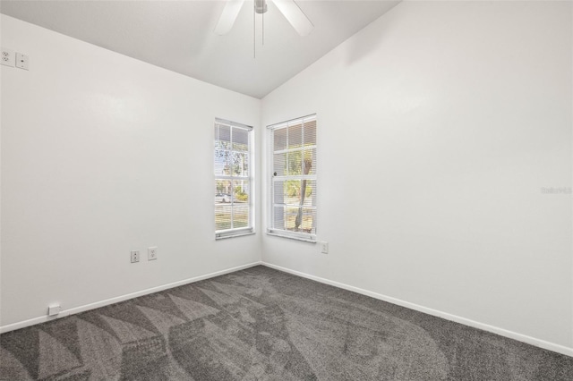 empty room with carpet, ceiling fan, and vaulted ceiling