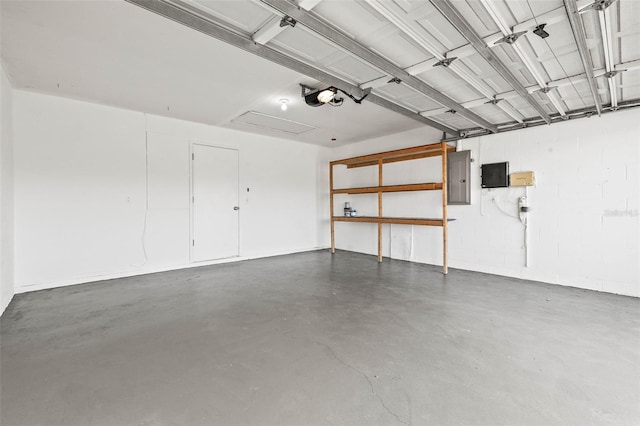 garage featuring a garage door opener and electric panel