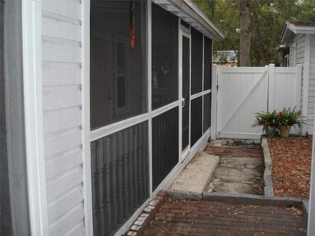 view of patio / terrace with a sunroom