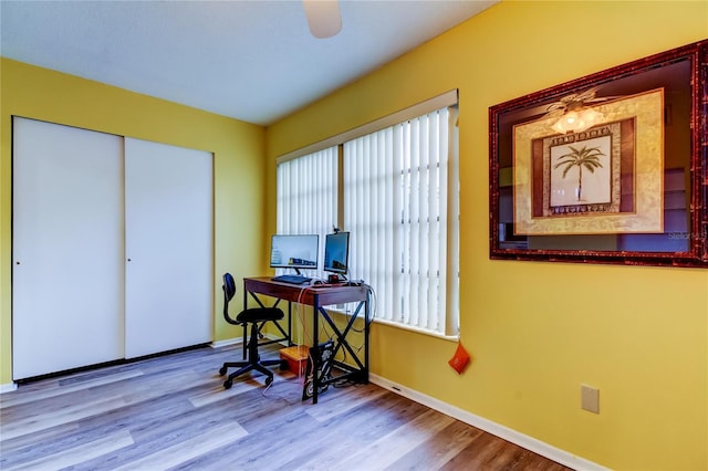 office area featuring ceiling fan and light wood-type flooring