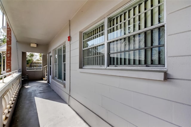 view of property exterior featuring covered porch