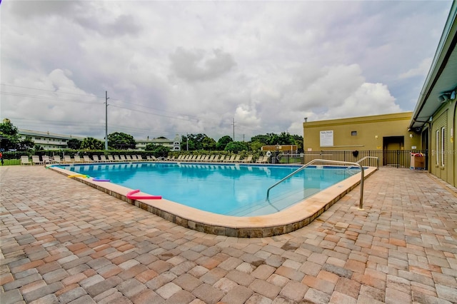 view of pool featuring a patio