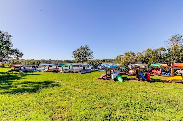 view of property's community featuring a yard