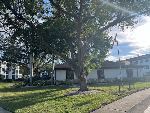 ranch-style house with a front yard