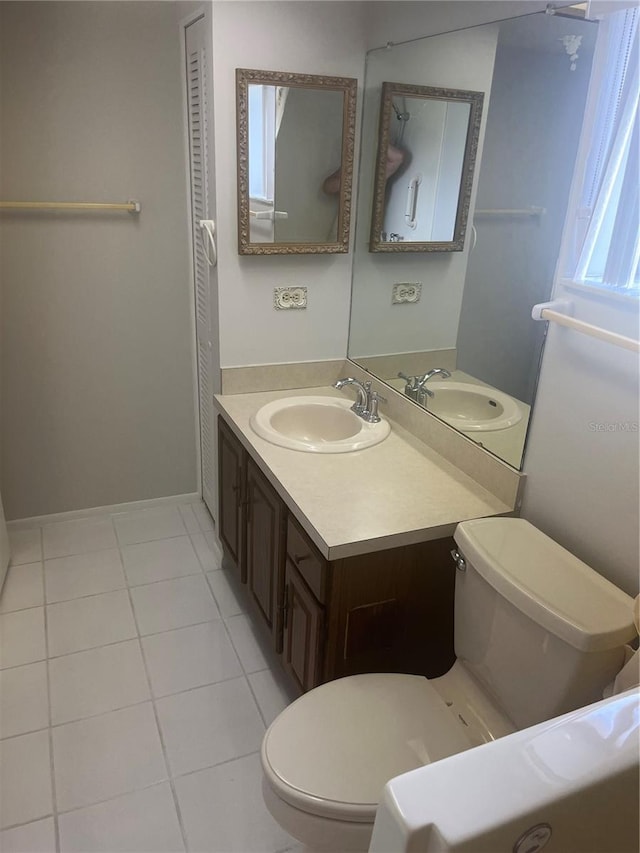 2593 Countryside Blvd Unit 7213, Clearwater, FL 33761 - bathroom featuring tile patterned floors and vanity