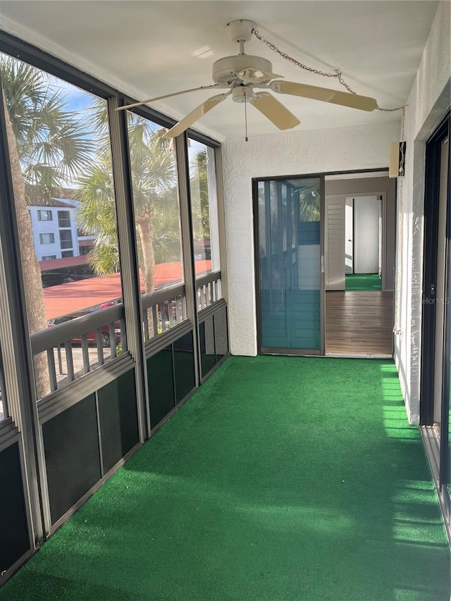 2593 Countryside Blvd Unit 7213, Clearwater, FL 33761 - unfurnished sunroom with ceiling fan