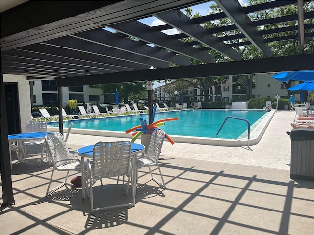 2593 Countryside Blvd Unit 7213, Clearwater, FL 33761 - community pool featuring a pergola and a patio