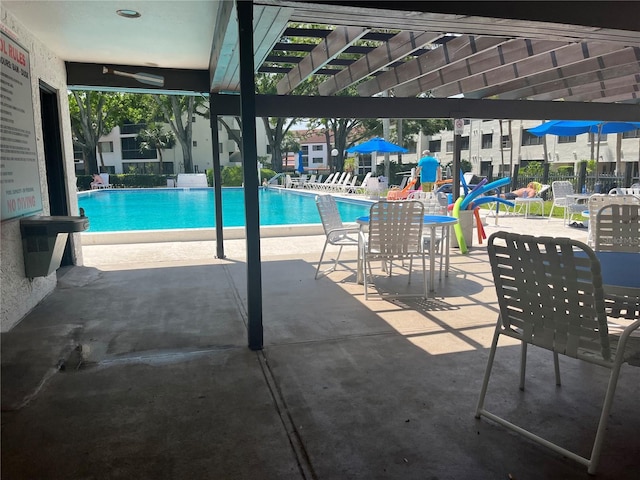 2593 Countryside Blvd Unit 7213, Clearwater, FL 33761 - community pool with a patio area
