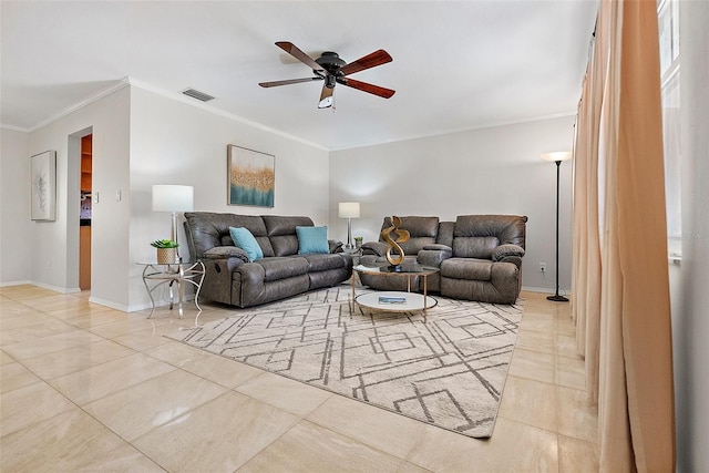 living room with ceiling fan and ornamental molding