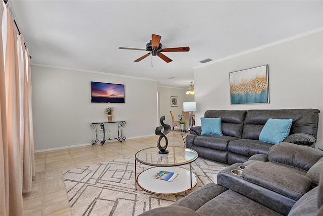 living room featuring ceiling fan and crown molding