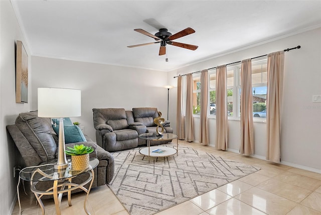 living room with ceiling fan, light tile patterned floors, and ornamental molding