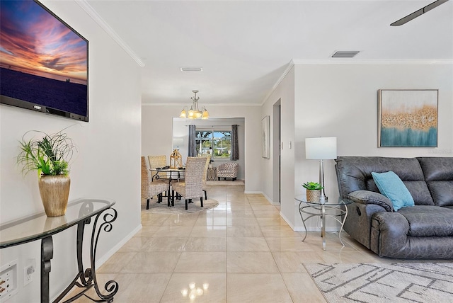 hallway with crown molding and an inviting chandelier