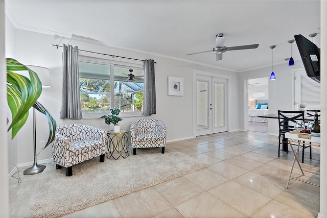 sitting room featuring tile patterned floors, ceiling fan, crown molding, and french doors