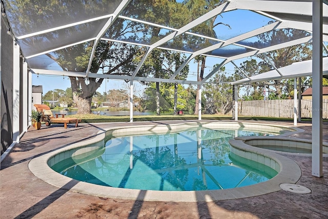 view of pool with a lanai