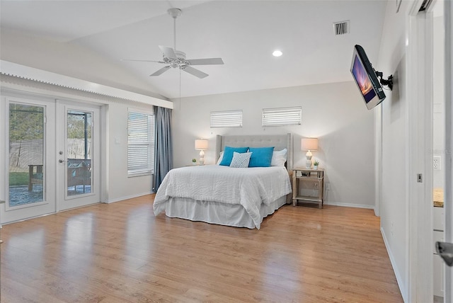 bedroom with access to exterior, french doors, vaulted ceiling, ceiling fan, and light hardwood / wood-style floors