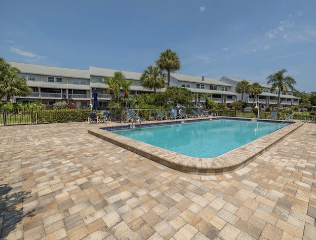 view of swimming pool featuring a patio area