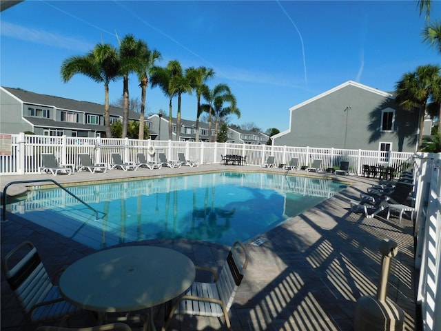 view of pool featuring a patio area