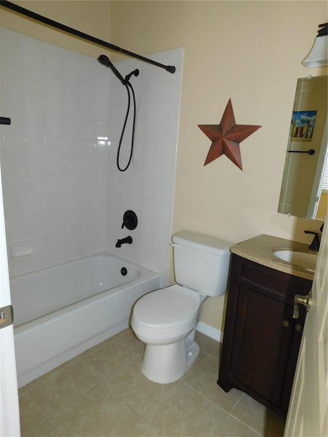 bathroom featuring shower / bath combination, baseboards, toilet, tile patterned floors, and vanity